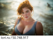 Happy curvy plus size model on the beach, fat busty chubby woman resting at the sea on summer holidays. Стоковое AI-изображение, AI-художник Станислав Тарко / Фотобанк Лори
