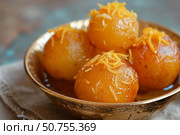 Delicious indian dessert with saffron and nuts in ornate bowl. Стоковое AI-изображение, AI-художник Иван Рябоконь / Фотобанк Лори