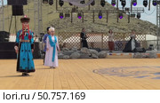 ELANTSY, IRKUTSK REGION, RUSSIA - July 5, 2025: Erdynskie Games – festival of nomadic peoples of Eurasia. Overview video of beauty contest participants on an open stage on sunny summer day. Редакционное видео, видеограф Виктория Катьянова / Фотобанк Лори