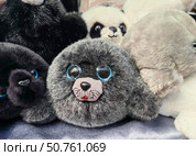 Stuffed animals in various poses showcasing adorable features in cozy display setting. closeup. Стоковое фото, фотограф ЛУНИНА ВЕРОНИКА / Фотобанк Лори