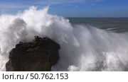 High waves breaking on rocks of coastline. Стоковое фото, фотограф Михаил Коханчиков / Фотобанк Лори