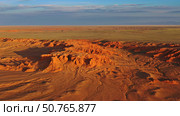 Bayanzag flaming cliffs at sunset in Mongolia. Стоковое фото, фотограф Михаил Коханчиков / Фотобанк Лори