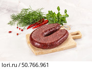 Delicious dry cured beef basturma on table, closeup. Стоковое фото, фотограф Андрей Старостин / Фотобанк Лори