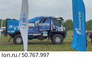 ANGARSK, IRKUTSK REGION, RUSSIA - July 13, 2025: XV International Silk Way Rally, racing competition. Video of start of famous sports blue truck No.301 KAMAZ master team in rain. Редакционное видео, видеограф Виктория Катьянова / Фотобанк Лори