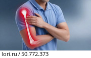 Man touching sore arm with highlighted bones. Стоковое AI-видео, аниматор Юрий Поздников / Фотобанк Лори