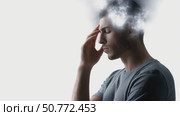 Man suffering from migraine with storm clouds inside his head. Стоковое AI-видео, аниматор Юрий Поздников / Фотобанк Лори