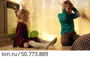 Family Fun Children Joyfully Blowing Up Balloons. Kids inflating balloons, prepare for birthday party. 3,6, 14 years old siblings racing blowing balloon, decorate the room. Bonding time together. Joy. Стоковое видео, видеограф Марина Демидюк / Фотобанк Лори
