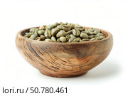 Green coffee beans filling a wooden bowl on white background. Стоковое AI-изображение, AI-художник Иван Рябоконь / Фотобанк Лори