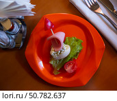 Devilled egg in shape of ship with sausage slice and fresh vegetables. Стоковое фото, фотограф Яков Филимонов / Фотобанк Лори