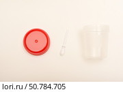 Jars for urine and fecal tests. Containers for medical tests. Стоковое фото, фотограф Valeriy Lushchikov / Фотобанк Лори