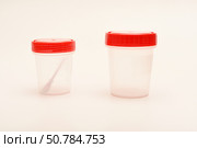Jars for urine and fecal tests. Containers for medical tests. Стоковое фото, фотограф Valeriy Lushchikov / Фотобанк Лори