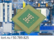 Процессор на материнской плате. Central Processing Unit CPU on the motherboard. Стоковое фото, фотограф Татьяна Д / Фотобанк Лори