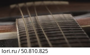 Acoustic guitar strings vibrating, Shot on super slow motion camera 1500 fps. Стоковое видео, видеограф Андрей Армягов / Фотобанк Лори