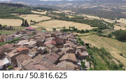 Bird's eye view of Figuerola d'Orcau, town in Isona i Conca Della, Catalonia, Spain. Стоковое видео, видеограф Яков Филимонов / Фотобанк Лори