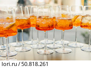 A Vibrant Collection of Sparkling Cocktails in Elegant Glasses, Showcasing Refreshing Colors and Ice, Perfect for Celebrations and Social Gatherings. Стоковое фото, фотограф Башкирова Анна / Фотобанк Лори