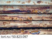 Detailed macro shot of rusty metal pipes showing layers of corrosion, oxidation patterns, and industrial decay over time. Стоковое AI-изображение, AI-художник Башкирова Анна / Фотобанк Лори