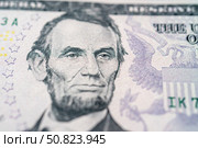 Portrait of American President Abraham Lincoln on a five dollar bill. Стоковое фото, фотограф Емельянов Евгений Викторович / Фотобанк Лори