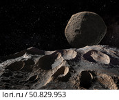 Dactyl moon hovering in the sky above asteroid Ida. Стоковое фото, фотограф Steven Hobbs/Stocktrek Images / ТАСС / Фотобанк Лори