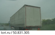 Truck driving on highway during heavy rain. Редакционное видео, видеограф Данил Руденко / Фотобанк Лори