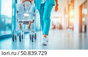 Medical Assistance: A nurse pushes a patient in a trolley through a bright hospital hallway, symbolizing care and recovery. Стоковое AI-изображение, AI-художник Данила Большаков / Фотобанк Лори
