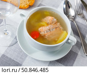 Salmon backbone soup in white tureen served with toasts. Стоковое фото, фотограф Яков Филимонов / Фотобанк Лори