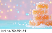 Sweet Temptation: Stack of Orange Fruit Jelly Candies Sprinkled with Sugar on a Festive Holiday Table for Print, Card, Poster. Стоковое AI-изображение, AI-художник Данила Большаков / Фотобанк Лори
