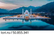 Illuminated Islamic Architecture: A serene mosque mirroring in lake water against a backdrop of mountains, under a twilight sky. Стоковое AI-изображение, AI-художник Данила Большаков / Фотобанк Лори