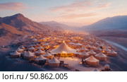 Desert Oasis: tent encampment nestled in a mountain valley, bathed in the warm glow of sunset. Стоковое AI-изображение, AI-художник Данила Большаков / Фотобанк Лори