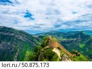 Picturesque mountain landscape with a photofacility tower of the Russian fortress in Gunib. Dagestan, Caucasus (2024 год). Стоковое фото, фотограф Константин Лабунский / Фотобанк Лори
