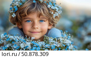 Portrait of a child with blue blossom: A springtime bloom. Стоковое AI-изображение, AI-художник Данила Большаков / Фотобанк Лори
