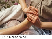 Natural medicine, reflexology, woman receiving foot massage, oppresses energy flow points, spa center calm interior. Стоковое фото, фотограф Владислав Тригуб / Фотобанк Лори