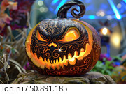Glowing halloween pumpkin showing spooky face with ornate carvings. Стоковое AI-изображение, AI-художник Иван Рябоконь / Фотобанк Лори