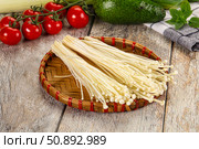 Raw enoki mushroom for cooking. Стоковое фото, фотограф Андрей Старостин / Фотобанк Лори