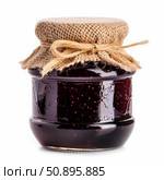 Glass jar of seedless raspberry jam wrapped in burlap on white background. Стоковое AI-изображение, AI-художник Иван Рябоконь / Фотобанк Лори