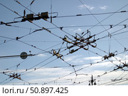 The intersection of several tram and trolleybus wires. Crossroad. Стоковое фото, фотограф Константин Тимофеев / Фотобанк Лори