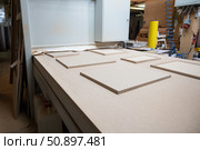 Grinding of wooden furniture panels on a machine. Стоковое фото, фотограф Jan Jack Russo Media / Фотобанк Лори
