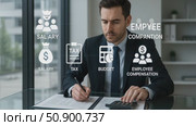 Business professional analyzing financial documents with interactive graphics display. Стоковое AI-видео, аниматор Владимир Федоров / Фотобанк Лори