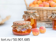 Preservation and summer harvest. Homemade healthy jelly, apricot jam. Preparing jars. Sweets and fruits. Стоковое фото, фотограф Photojuli / Фотобанк Лори