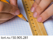 draftsman draws on a ruler. Стоковое фото, фотограф Олег Жуков / Фотобанк Лори
