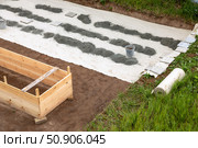 Construction site of a new house with a concrete floor and a wooden frame. Стоковое фото, фотограф Nobilior / Фотобанк Лори