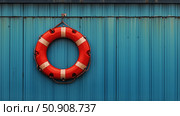 Life Preserver on a Bright Blue Wall at a Waterfront Location in Warm Sunlight. Стоковое AI-изображение, AI-художник Юлия Гапеенко / Фотобанк Лори