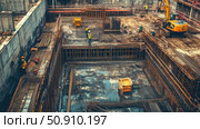 Photo of a construction site at an early stage of building construction. The view from above shows a pit with reinforced concrete structures, workers in protective clothing and helmets, and heavy equipment - an excavator in the background. The image demonstrates the intensive construction process, the stage of foundation reinforcement and the interaction of specialists. Suitable for the topics of construction, architecture, engineering projects and industry. Стоковое AI-изображение, AI-художник Анна Кривицкая / Фотобанк Лори