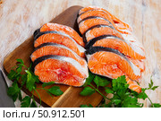 Fresh salmon steaks with lemon and greens. Стоковое фото, фотограф Яков Филимонов / Фотобанк Лори