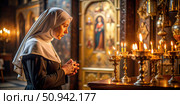 A Nun Praying Before Candles in an Old Orthodox Church. Generative AI. Стоковое AI-изображение, AI-художник Roman Zavorotny / Фотобанк Лори