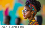 Profile portrait of a young african woman with colorful headwrap and glasses, with abstract background. Стоковое AI-изображение, AI-художник Данила Большаков / Фотобанк Лори