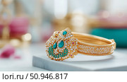 Elegant gemstone and gold bangle bracelet, jewelery for special occasion. Стоковое AI-изображение, AI-художник Данила Большаков / Фотобанк Лори
