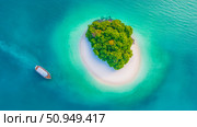 Summer vacation destination, aerial view of tropical island with turquoise ocean, lush vegetation, and boat, perfect for travel content. Стоковое AI-изображение, AI-художник Данила Большаков / Фотобанк Лори