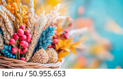 Autumn bounty display with wheat and berries in a basket, fall harvest, celebration of seasonal richness for print or background. Стоковое AI-изображение, AI-художник Данила Большаков / Фотобанк Лори
