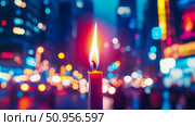 A solitary lit candle flame illuminating a serene, contemplative moment against a vibrant, blurred city nightscape with colorful bokeh radiance, perfect for atmospheric celebration or remembrance. Стоковое AI-изображение, AI-художник Данила Большаков / Фотобанк Лори