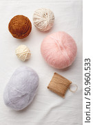 Balls of wool and mohair for knitting in pastel colors. Стоковое фото, фотограф Ирина Буракова / Фотобанк Лори